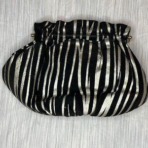 Vintage 80’s black and gold striped clutch with clam metal opening